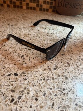 OtterBox Black Sunglasses with Gold Logo Text